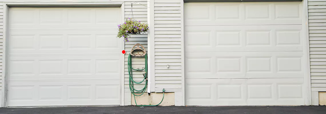 Sectional Garage Door Dropped Down Repair in Lockport, Illinois