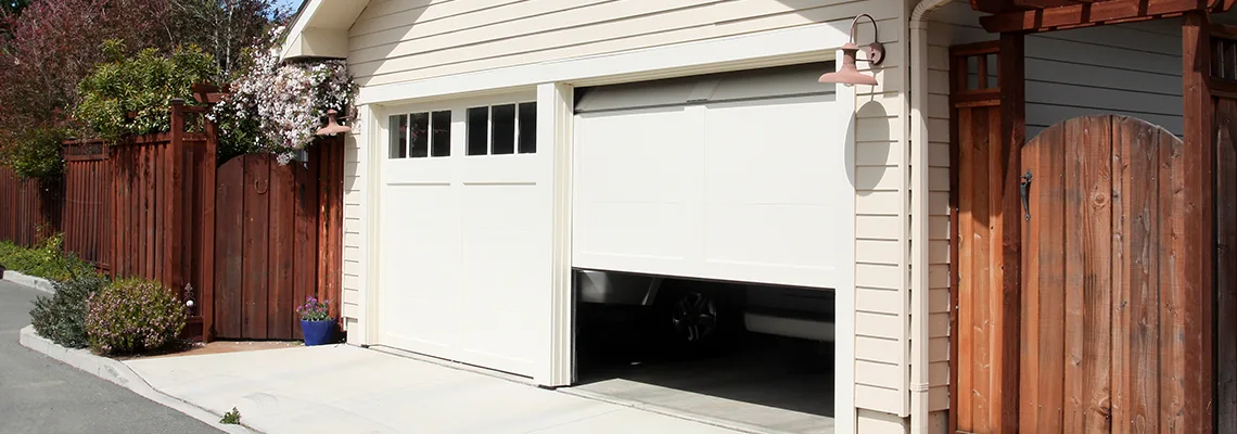 Fix Metal Garage Door Jerking in Lockport, Illinois